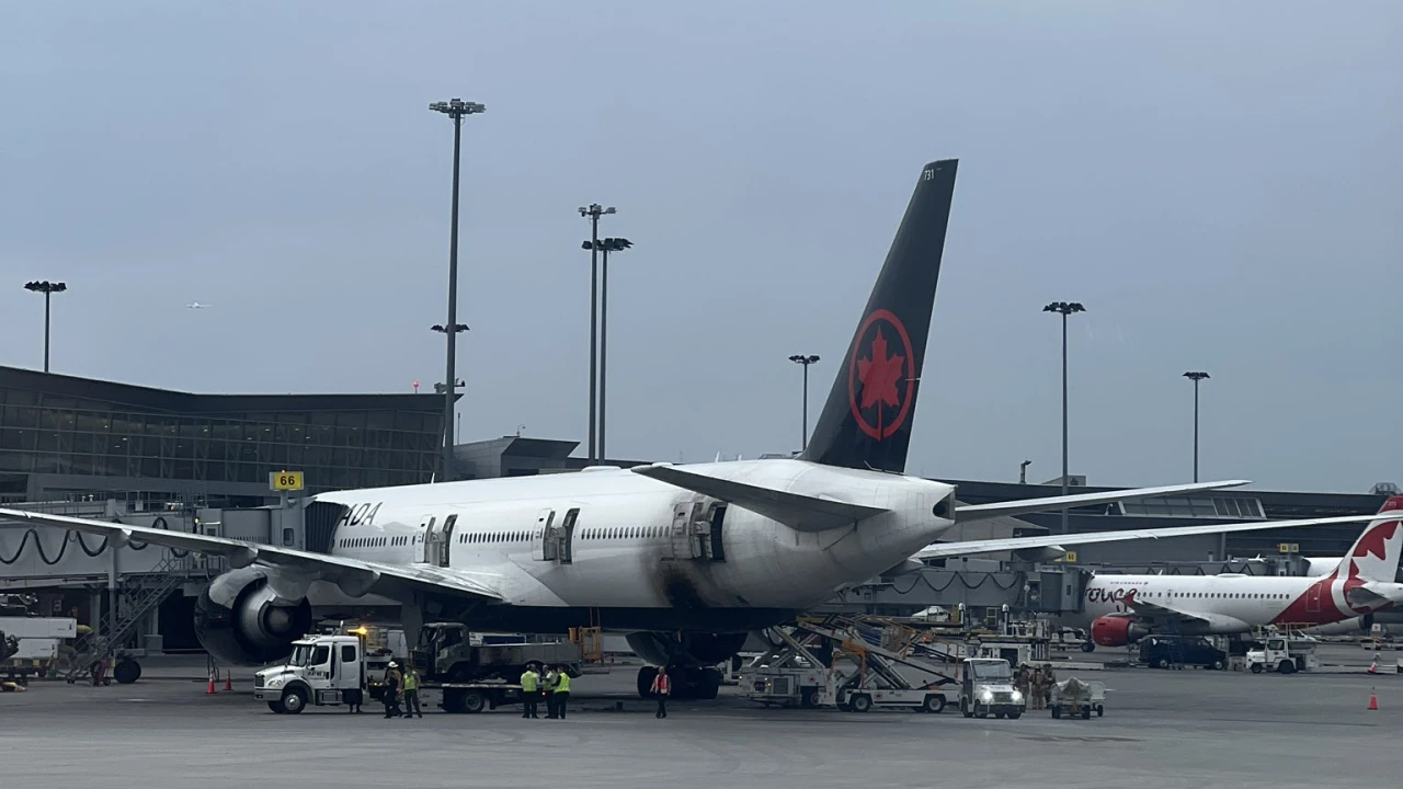 Plane engulfed in flames after fire breaks out in airport vehicle