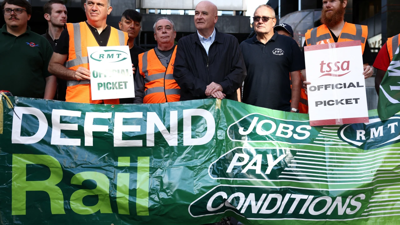 UK railways workers hold strike for better pay,  conditions