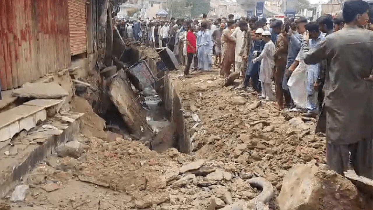 Gas-filled blast in drain leaves six injured