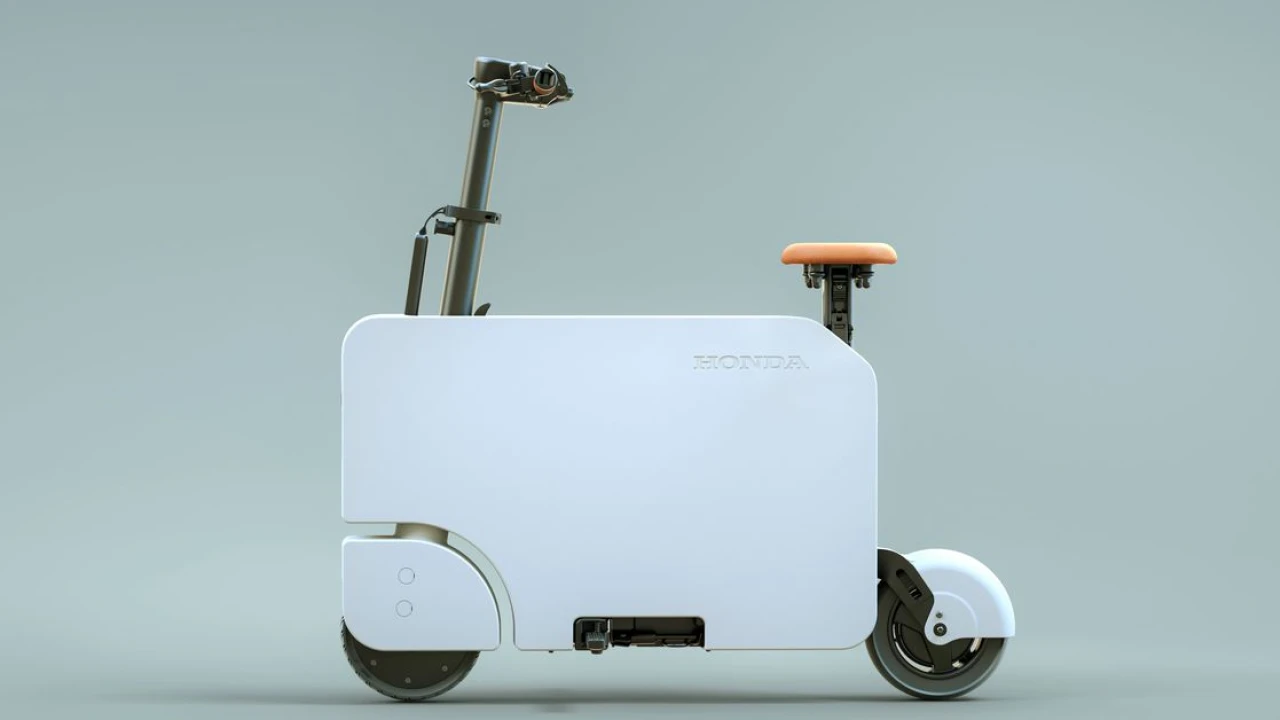 Honda’s Motocompacto scooter will satisfy your secret desire to ride an electric suitcase to work
