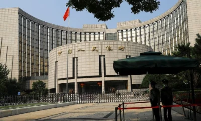 China central-bank adviser proposes structural reforms to revive economy
