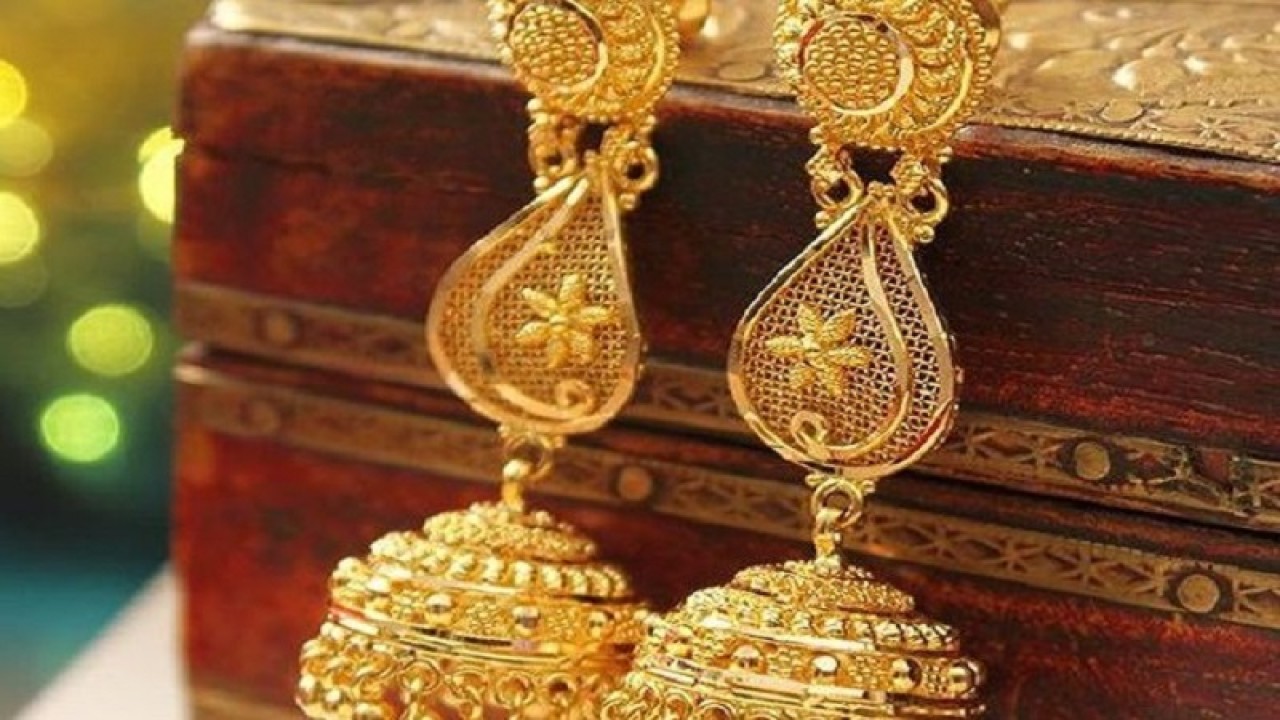 In Photo: Gold Earrings