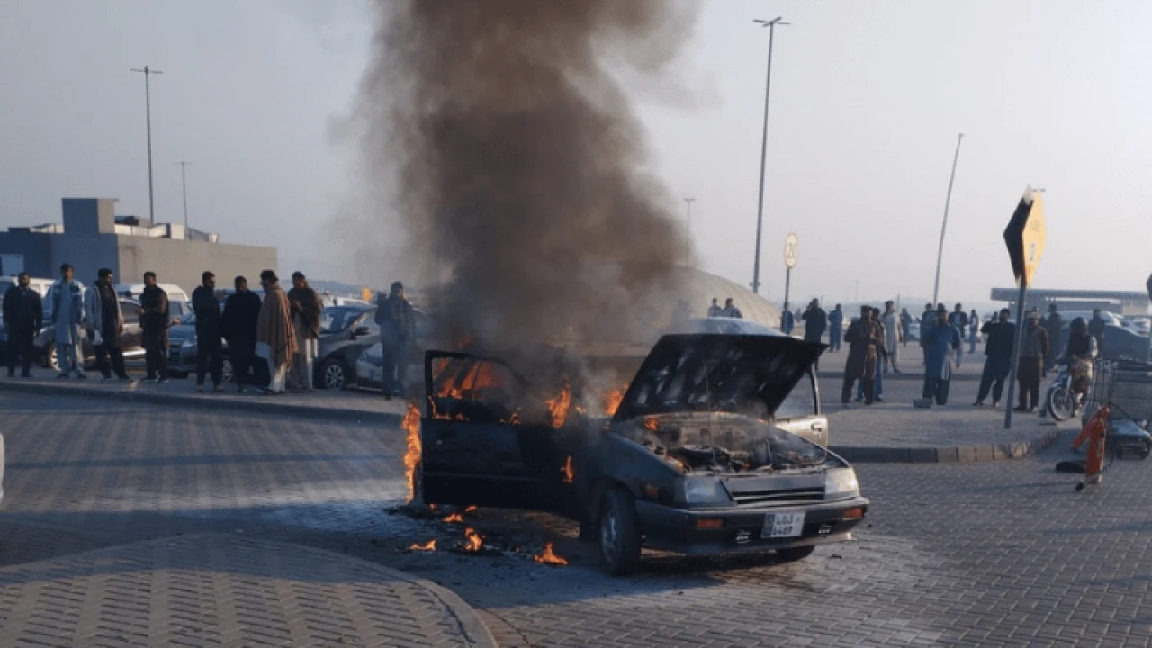 Car parked at Lahore Airport catches fire