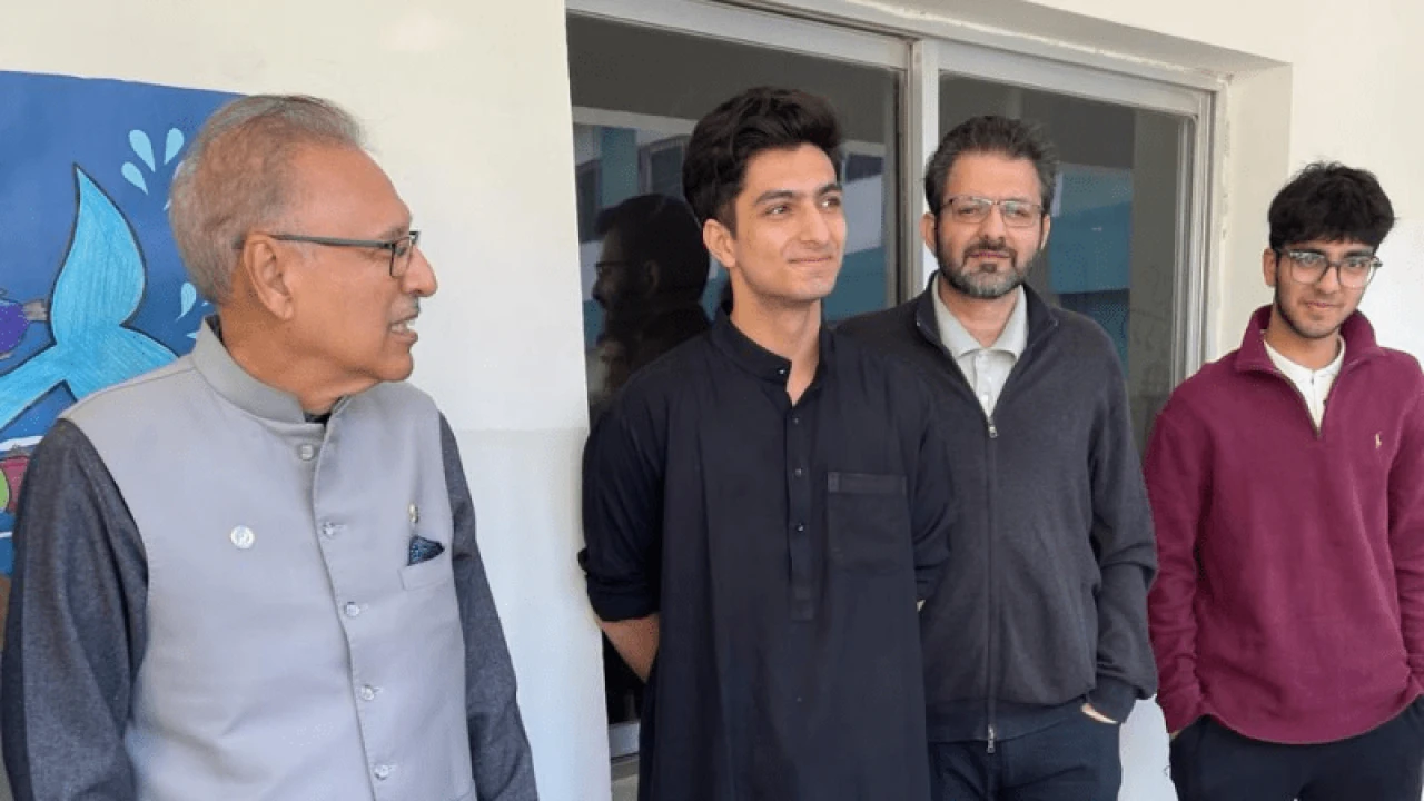 President Alvi casts vote along with family